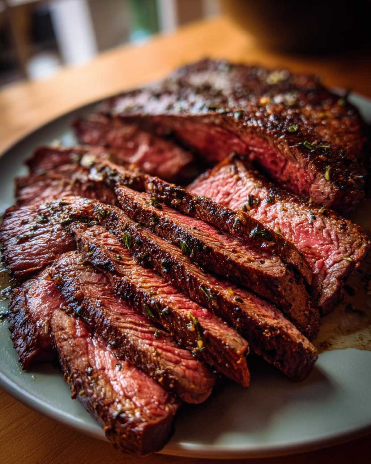 Close-up of sliced carne asada showing the juicy, flavorful meat after using the carne asada marinade.