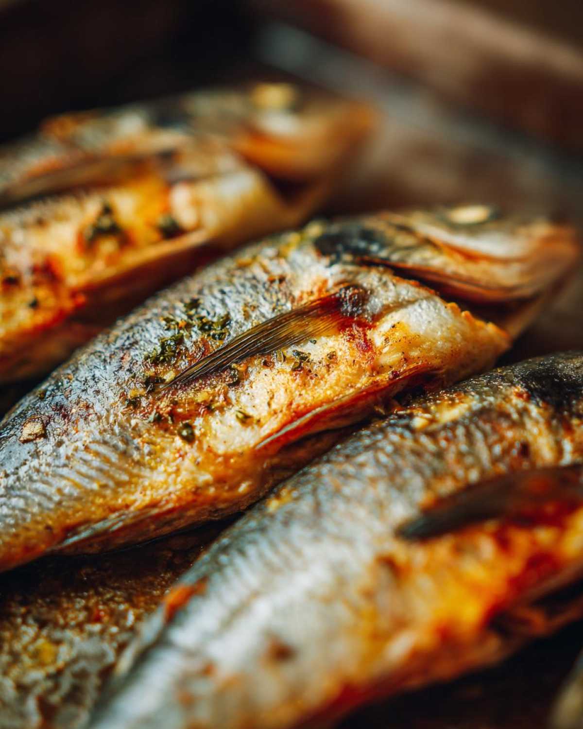 Close-up of Garlic Butter Baked Tilapia, showing the texture and herbs.